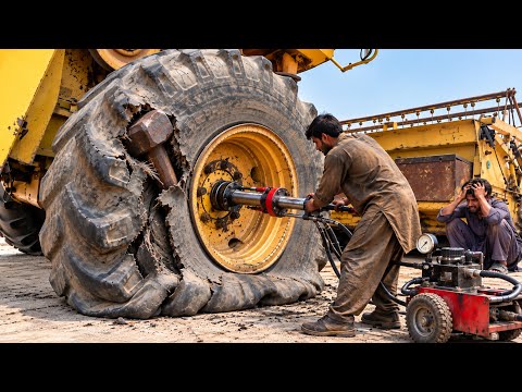 Huge Hammer Stuck in a Wheat Harvesting Machine Tire!