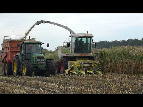 Mais hakselen met Claas Jaguar 860 + John Deere 2850, 6900 en Case IH Magnum 7110 op de kuil (2026)