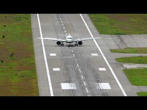 a320 landing in the mountainous airport of Paro Bhutan.