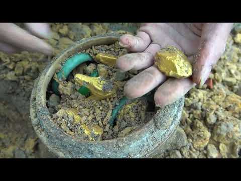 Moment of finding treasure full of diamond, gold and jewels treasure hunting using digging tool